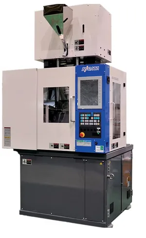 Niigata MDVR S8000 vertical injection molding machine with rotary table